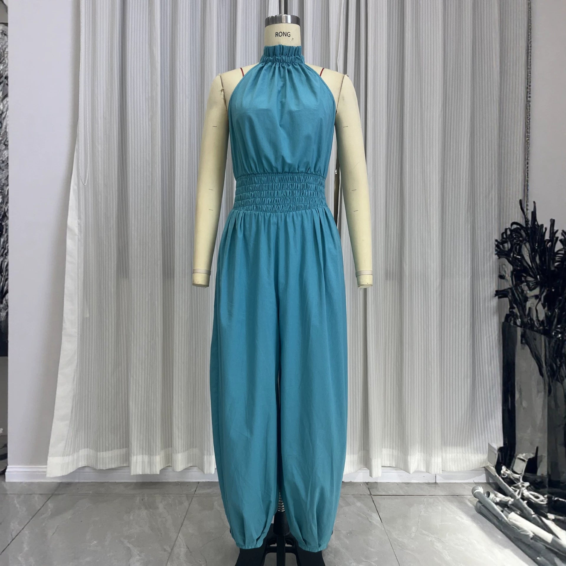 Casual style sleeveless hanging neck lantern pants jumpsuit for women