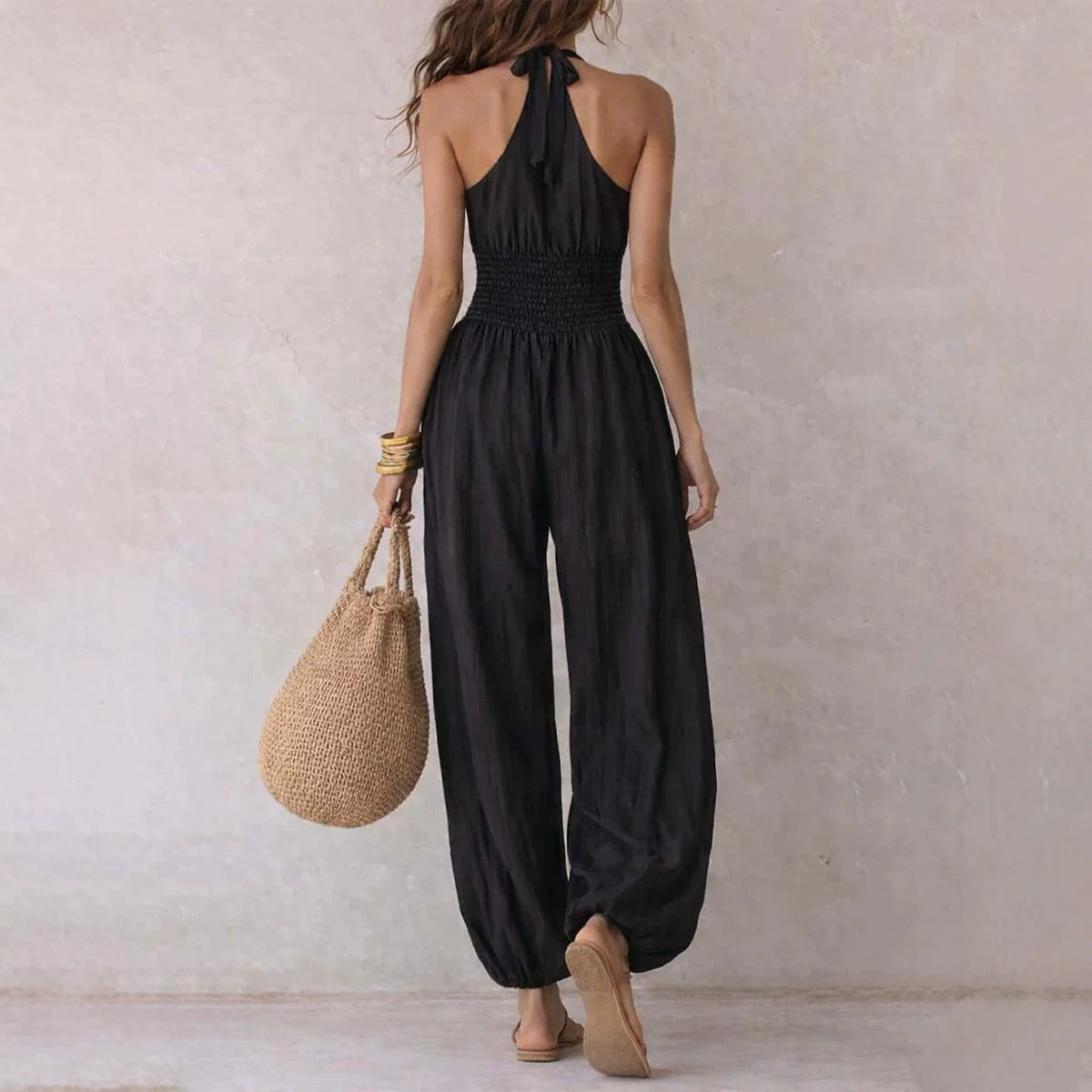 Sleeveless hanging neck backless high waisted jumpsuit